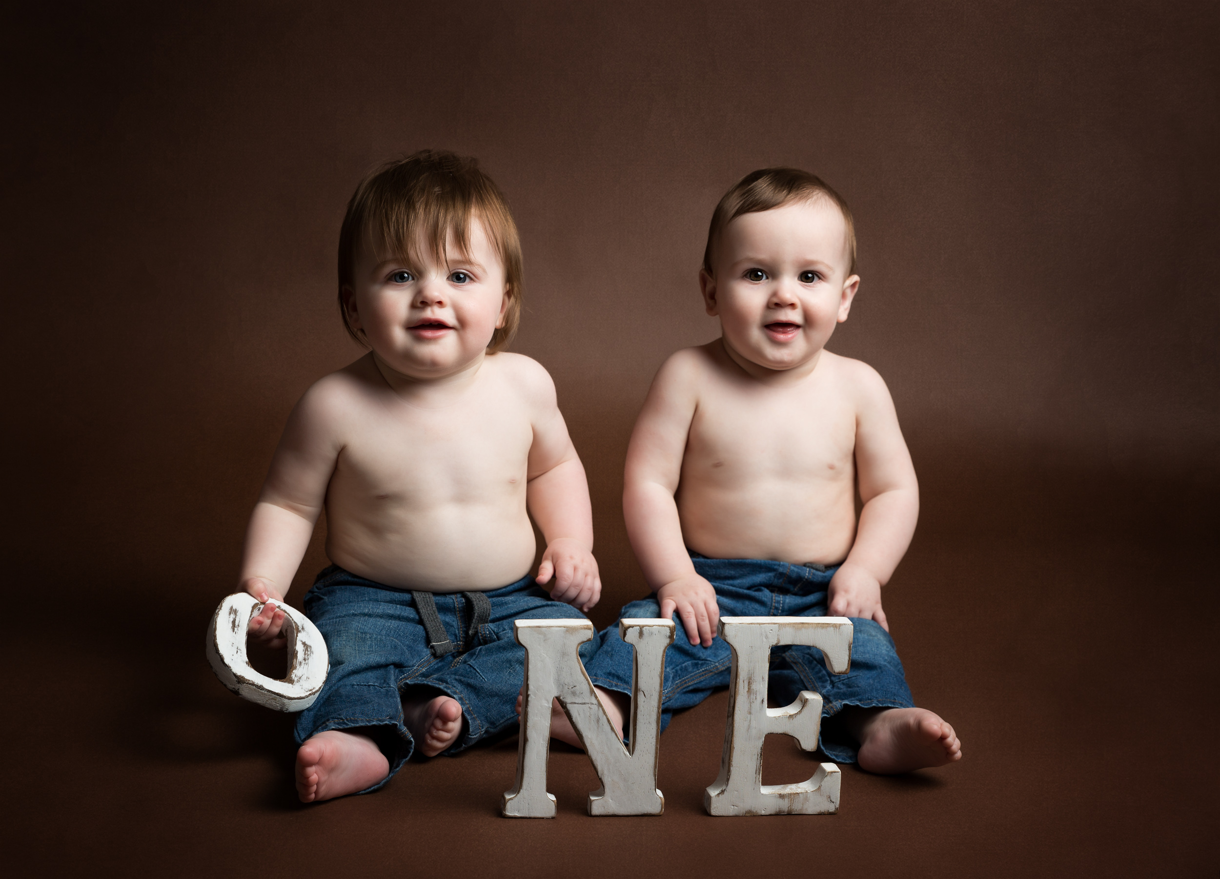 Twin boys celebrating their first birthday with a photo shoot in Cheshire