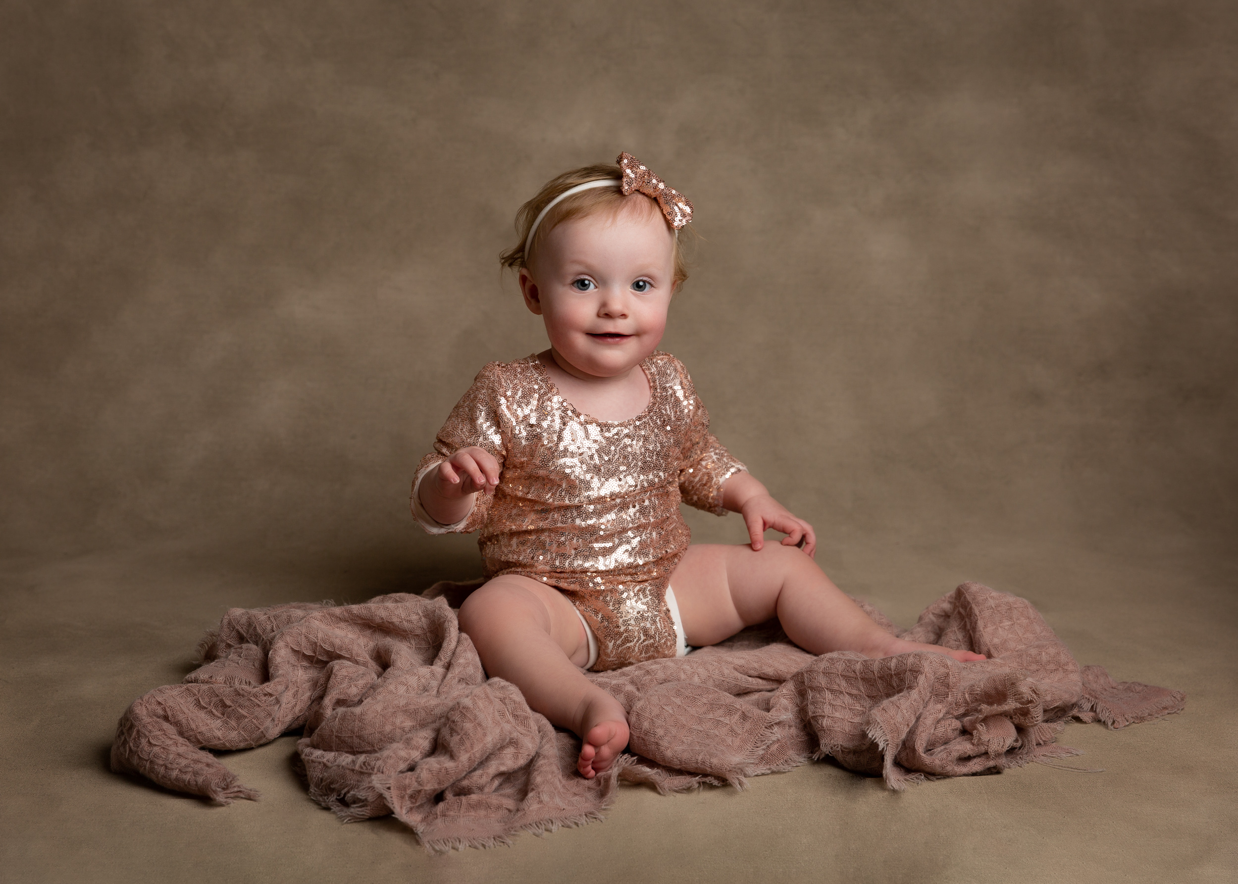 1 year old girl celebrating her birthday with a photo shoot in Cheshire