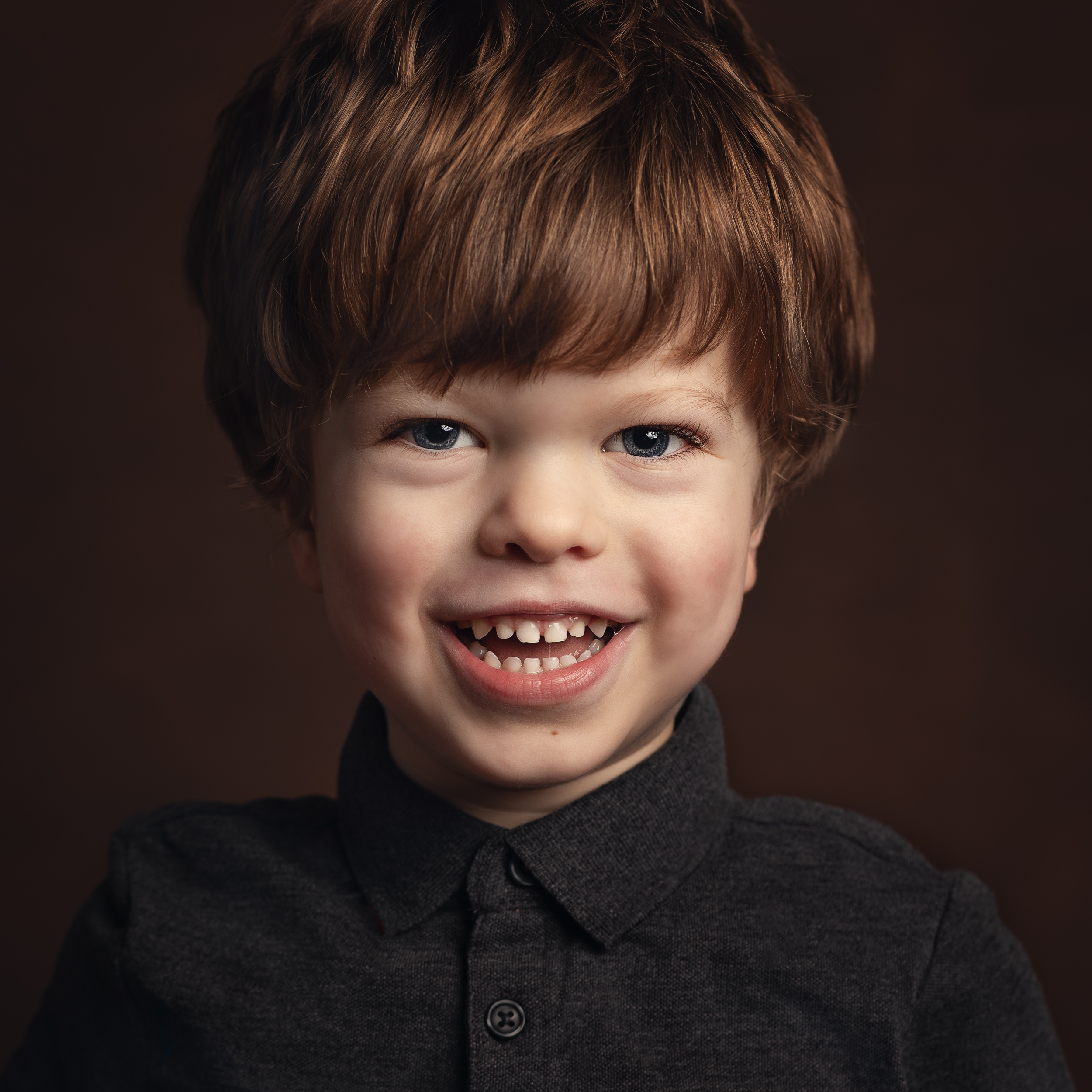 A close up shot of Rufus during his child portrait session in Cheshire
