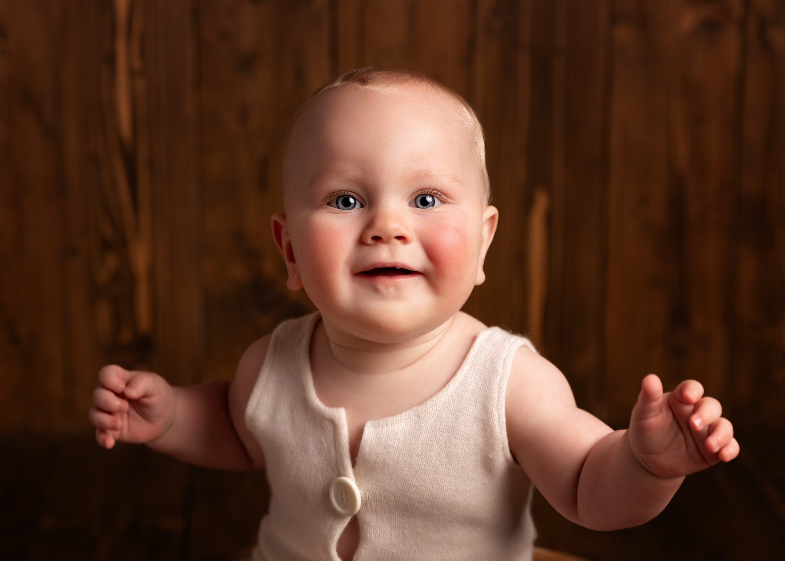 Happy baby during a sitter session in Sandbach, Cheshire