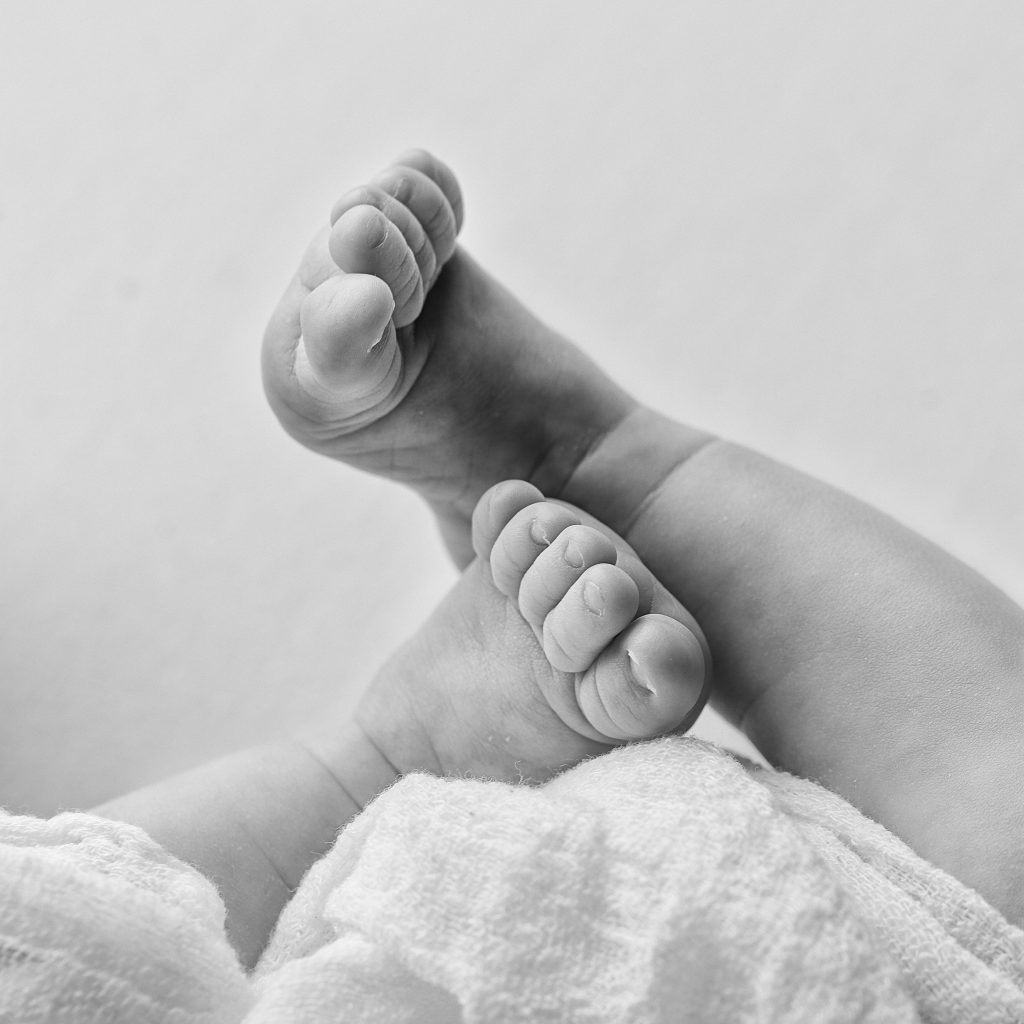 Macro shot of baby feet in monochrome - Sandbach Photographer