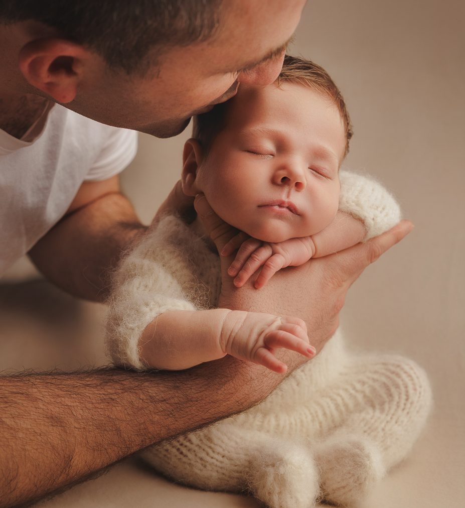 Relaxed newborn posing